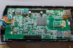 Internal electronics of OBD2 diagnostic VCI tool with visible components