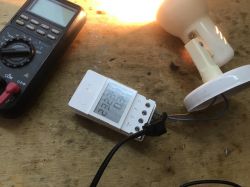 Sonoff POWR316D connected to a lamp and a multimeter