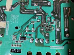 Close-up of a green circuit board with a burnt component labeled U3.