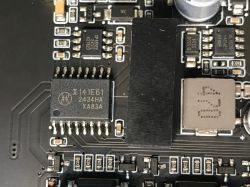 Integrated circuit on PCB with various SMD components Close-up of a circuit board with labeled IC and SMD components