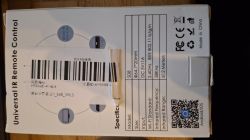 Packaging of universal infrared remote control S08 with barcode and technical specifications.