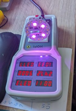 LED board placed on a voltage meter.