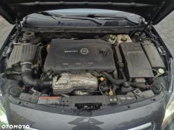 Opel Ecotec car engine under an open hood.