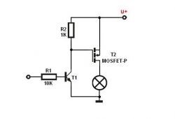 Schemat układu z MOSFET-em P-kanałowym, rezystorami, i emiterem.
