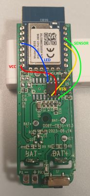 Circuit board with soldered wires marked with colors: VCC in red, LED in blue, SENSOR in green, BTN in yellow.