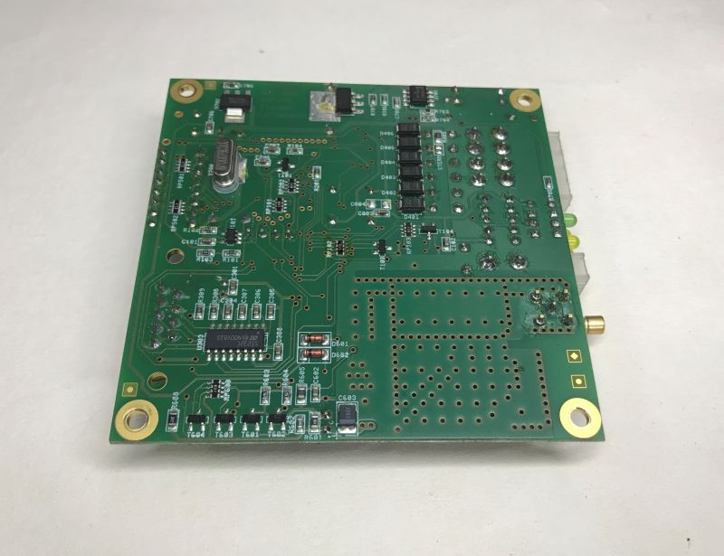 Bottom of a two-layer PCB with SMD electronics and vias