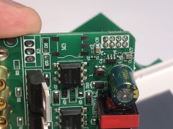 Photo of the interior of a dual touch light switch ATLO-TB2-TUYA showing triacs and CB3S module.