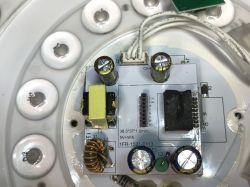 Interior of Woox ceiling lamp with visible WB3S WiFi module.