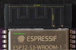 Close-up of ESP32-S3-WROOM-1 module with visible antenna.