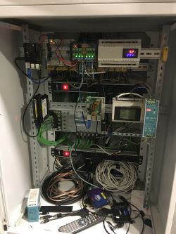 Server cabinet with network devices and wiring.