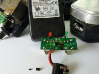 Screwdriver Charger Repair: 23V 400mA Output, 18V Battery, Burned Circuit Board, Transistor & Diode Screwdriver Charger Repair: 23V 400mA Output, 18V Battery, Burned Circuit Board, Transistor & Diode