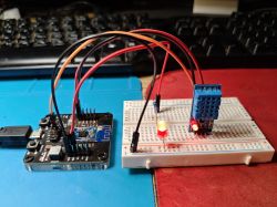 TR6260 Module with DHT Sensor on Breadboard Development board with a WiFi module and sensor connected to a breadboard with an LED.