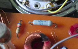 Close-up of electronic components including a DOG 56 germanium diode on a circuit board