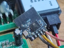 Image of an electronic module with B9 marking, with wires soldered to terminals.