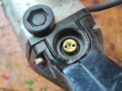 Damaged Button on Celma PRCb Drill Close-up view of Celma PRCb drill with a damaged button.