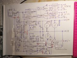 Ręcznie narysowany schemat zasilacza na kartce w kratkę, z opisami napięć 12V DC, 5V DC i V+/V−.