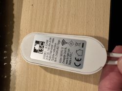 LSC controller with technical label on a wooden surface.