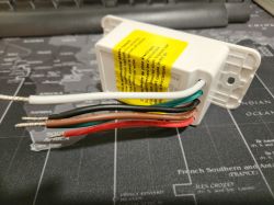 Electrical Module with Wires on a Map Electrical module with colored wires on a map.
