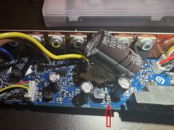 Electronic circuit with a marked diode labeled with a triangle and the text 2028 1 M.