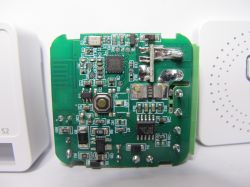 Close-up view of an electronic device's circuit board with components.
