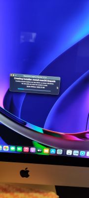 Computer screen displaying OpenCore Legacy Patcher 2.2.0 with a message about creating a macOS Sequoia installer.
