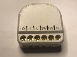 Top view of Refoss R10 relay module housing with terminal labels visible