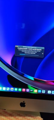 Mac computer screen displaying the OpenCore Legacy Patcher window creating a macOS Sequoia installer.