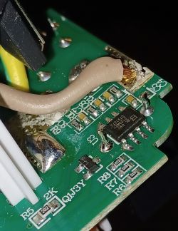 Close-up of Circuit Board Inside Smart Plug Close-up of a smart plug circuit board.