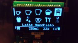 Electronic display showing various beverage icons and details about Latte Macchiato.