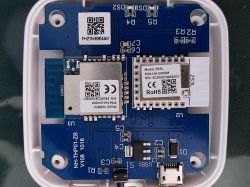 Interior of an electronic device with visible PCB and communication modules.