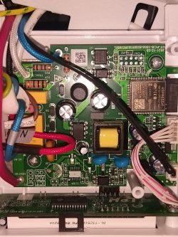 PCB with ESP32 module, power components and various connected wires