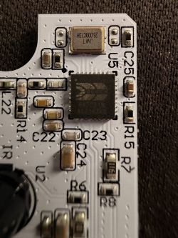 Close-up of a PCB with an IC and SMD parts; labels C22, C23, R15, C25 visible