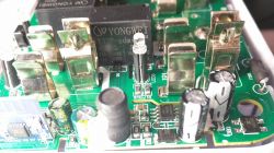 Close-up of internal circuitry on a PCB with electronic components.