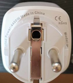 Front of Electrical Plug Casing Front view of an electrical plug casing labeled Rated Power: 4400W Made in China with CE and RoHS markings.