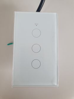 Touch switch with three buttons on a white panel.