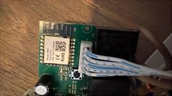 Close-up of an internal circuit board with a communication module.