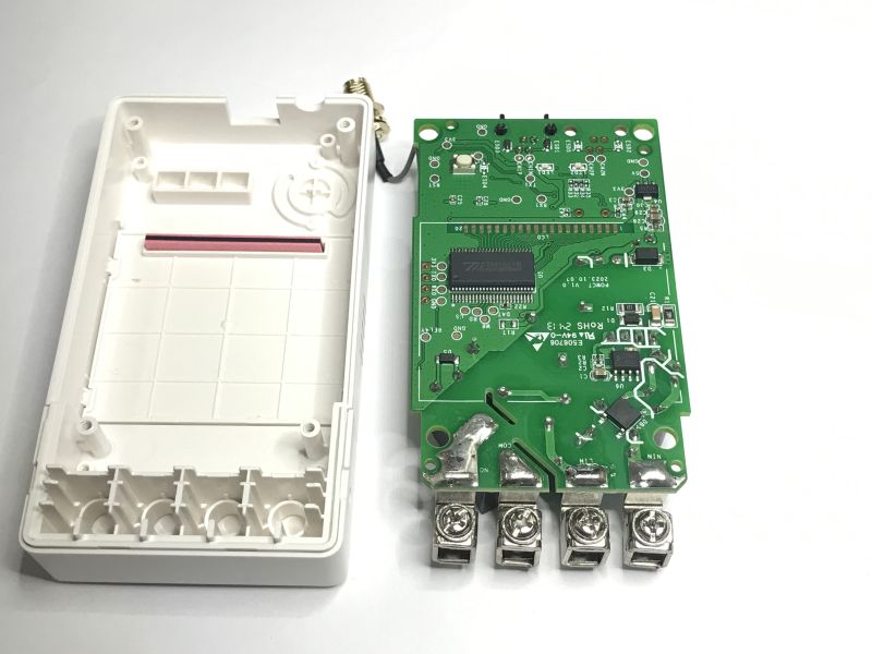 Open housing and Sonoff device PCB with four screw terminals