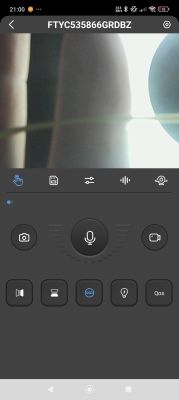 Camera app interface with microphone enabled and blurred lens view