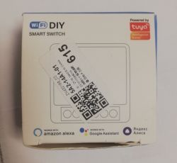 WiFi DIY Smart Switch Box WiFi DIY Smart Switch box with a sticker and QR code.