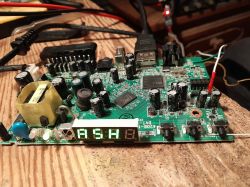Tuner circuit board with ASH on display and connected diagnostic wires.