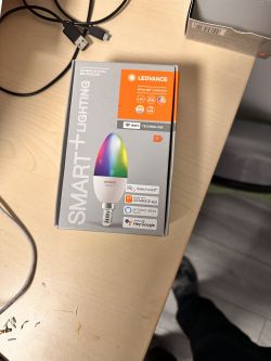 LEDVANCE Smart Bulb Packaging LEDVANCE smart bulb packaging on a desk.