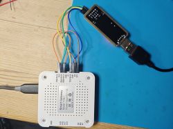 Electronic device with wires connected to a USB adapter.