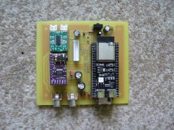 Assembled PCB with ESP32, PAM8403 amplifier module, and RCA connectors