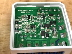Interior view of the WSM16-W1 electronic module with electronic components on a green PCB.