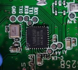 Close-up of a circuit board with an LN8825B chip and path markings.
