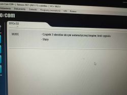 Zdjęcie ekranu komputera z diagnostyką samochodową pokazującą błąd 18201.