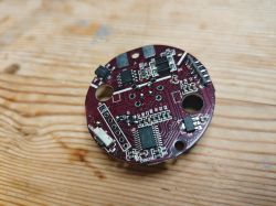 Close-up of a circuit board for the Tuya DY-RQ400A gas alarm with electronic components.
