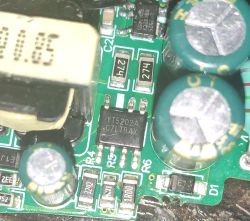 Circuit Board with Electronic Components and YT5202A Chip A section of a circuit board with electronic components, including capacitors, resistors, and a YT5202A integrated circuit.