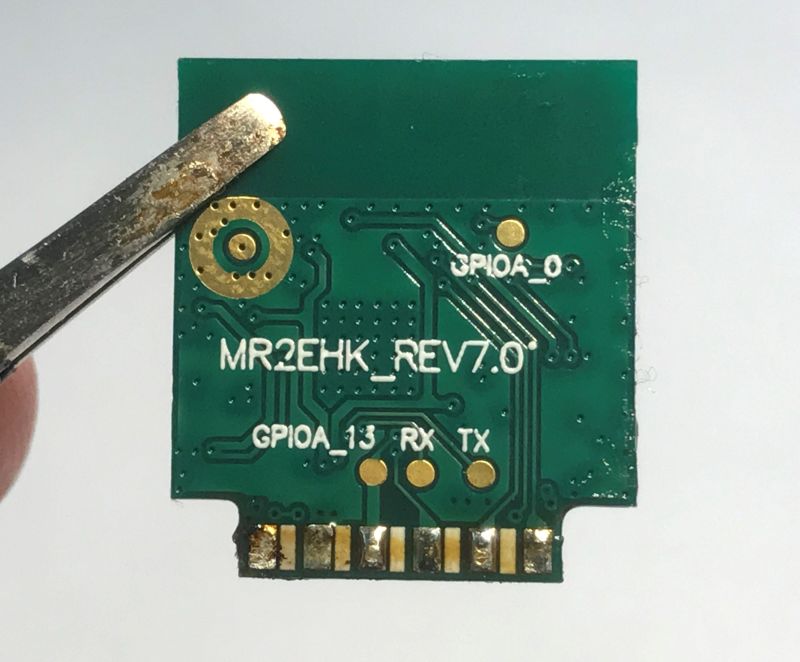 Green PCB with MR2EHK_REV7.0 label and gold contacts at the bottom edge