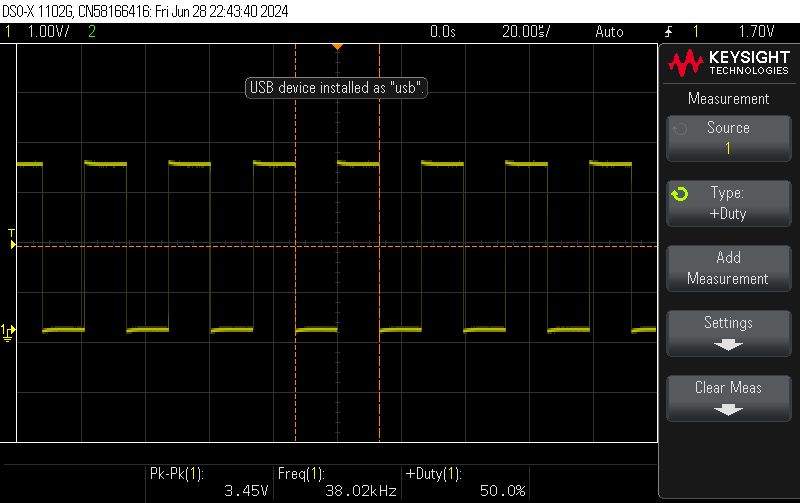 PWM Signal Plot on Oscilloscope Oscilloscope displaying a PWM signal at 38 kHz frequency.